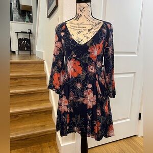 Free people navy floral quarter sleeve dress with pockets